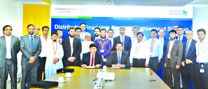 Rajesh K Surana, CEO of LafargeHolcim Bangladesh Limited and Abrar A. Anwar, CEO of Standard Chartered Bank Bangladesh, inks a deal for 'Distributor Financing" to enhance its business capacity recently. Five distributors of LafargeHolcim Bangladesh Limi