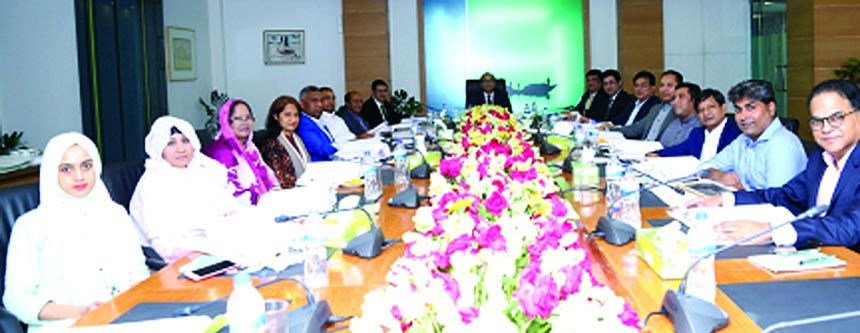 Humayun Kabir, Chairman of the Board of Directors of Modhumoti Bank Limited, presiding over its 27th Board of Directors meeting at the bank's head office recently. Barrister Sheikh Fazle Noor Taposh, MP, Chairman, Executive Committee, was present among o