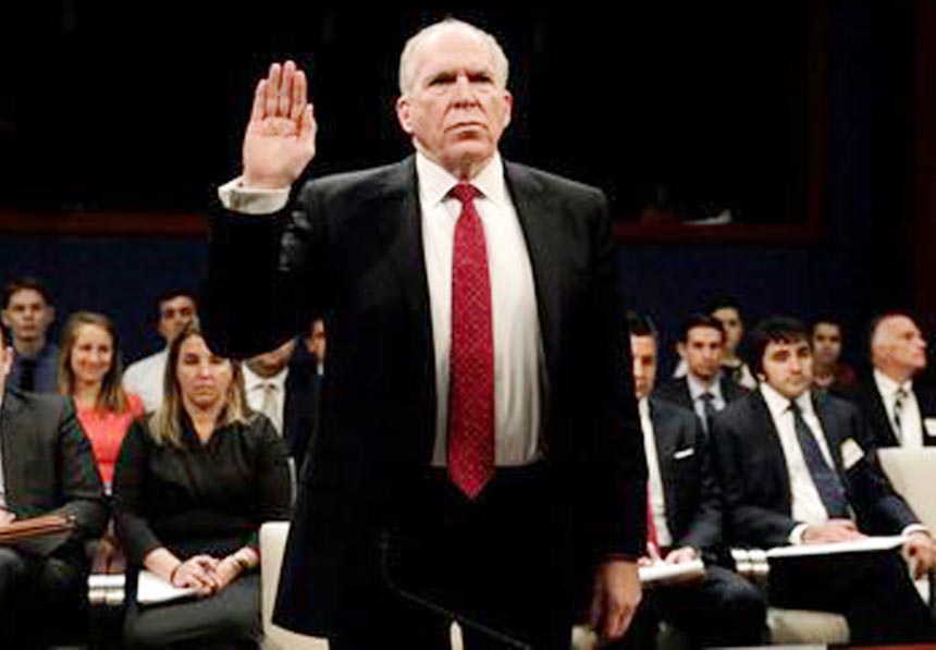 Former CIA director John Brennan is sworn in to testify before the House Intelligence Committee to take questions on "Russian active measures during the 2016 election campaign"" in the US. Capitol in Washington."