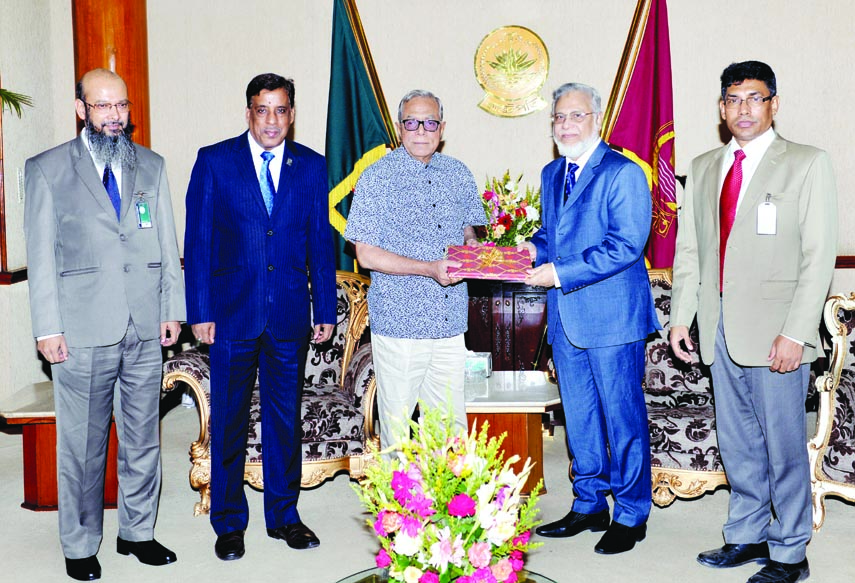 Law Commission Chairman Justice ABM Khairul Haque submitted annual report of the Commission to President Abdul Hamid at Bangababan yesterday.