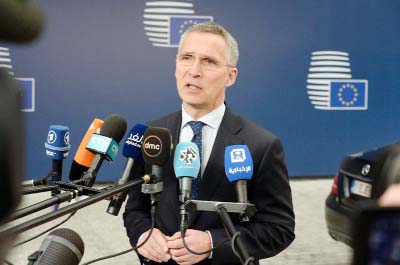 NATO Secretary-General Jens Stoltenberg addresses a news conference in Brussels on Wednesday.