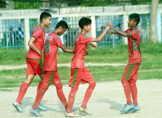 Players of Wazed Miah Krira Chakra celebrate after defeating Uttaran Jubo Sangsad by 6-0 goals in their match of the Dhaka North City Corporation and Dhaka South City Corporation Pioneer Football League at the Paltan Maidan on Thursday.