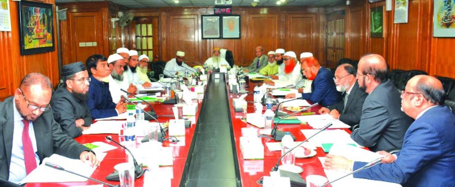 Sheikh Moulana Mohammad Qutubuddin, presiding over a meeting of Shariah Supervisory Committee of Islami Bank Bangladesh Limited as Chairman at its head office in the city recently. Md. Abdul Hamid Miah, Managing Director of the bank, Dr. Mohammad Abdus Sa