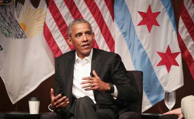 Former US President Barack Obama speaking in a panel discussion on democracy in Berlin on Thursday.