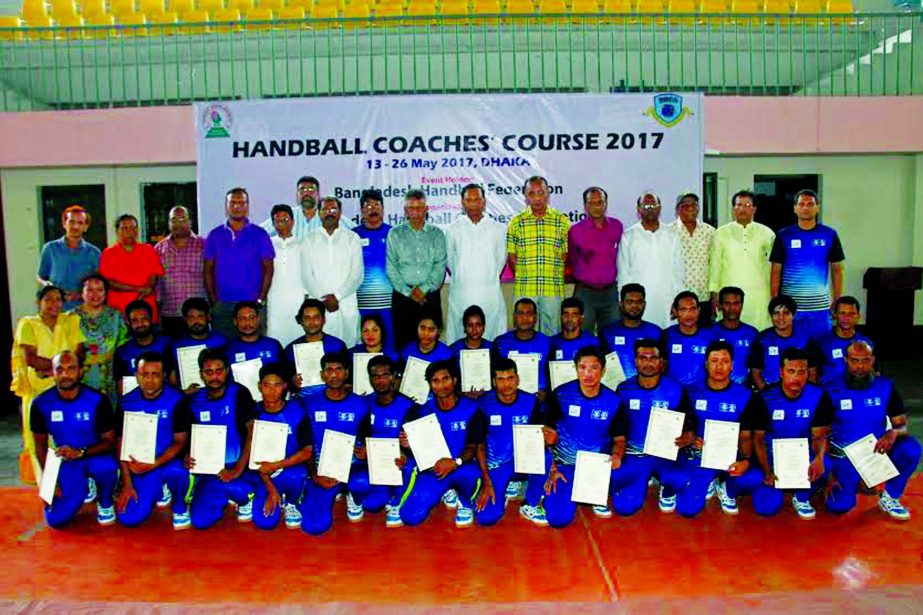 The participants of the handball coaches' course pose with their certificates with the chief guest Secretary of Youth and Sports of Bangladesh Awami League Harun-ar-Rashid and the other guests and officials of Bangladesh Handball Federation at the Shahee