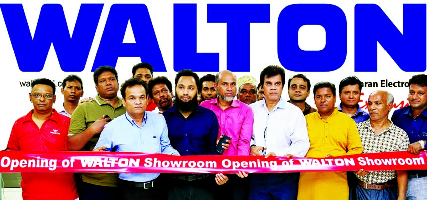 Film actor Ilias Kanchan, inaugurating a Walton Exclusive Distributor Showroom at Nazira Bazar, Bangshal in the city recently. Amdadul Haque Sarker, ED (Marketing), Md. Humayon Kabir, ED (PR) and Moudud Parvez (Mamun), Sr. Assistant Director of the compan