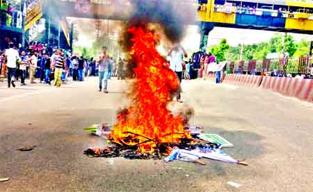 Angry students of Jahangirnagar University on Saturday blocked the Dhaka-Aricha Highway for 4-5 hours by torching woods and straw in protest against killings of two fellow students in road accident.