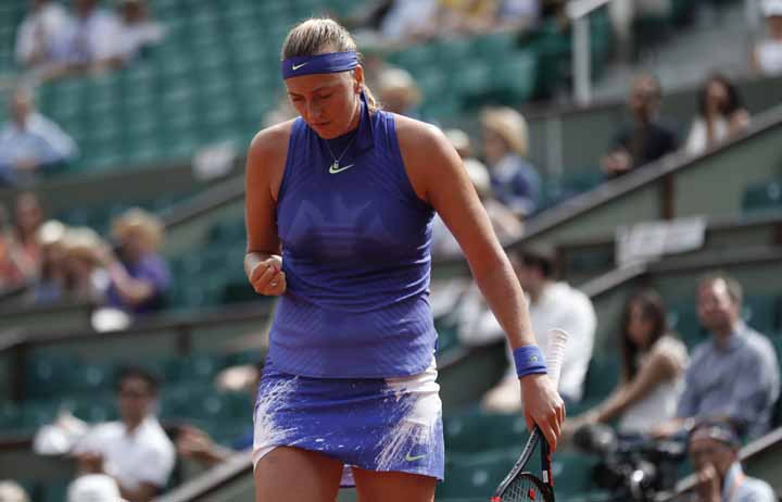 Petra Kvitova of the Czech Republic clenches her fist after winning a point against Julia Boserup, of the U.S, during their first round match of the French Open tennis tournament at the Roland Garros stadium in Paris on Sunday.
