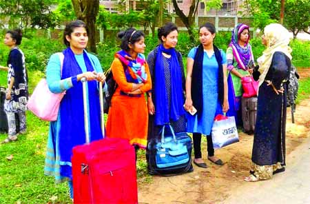 The students of Jahangirnagar University leaving their dormitories as the authorities asked them to vacate those immediately after its closure for an indefinite period on Sunday. The students burst into protests vandalizing the Vice-Chancellor's residen