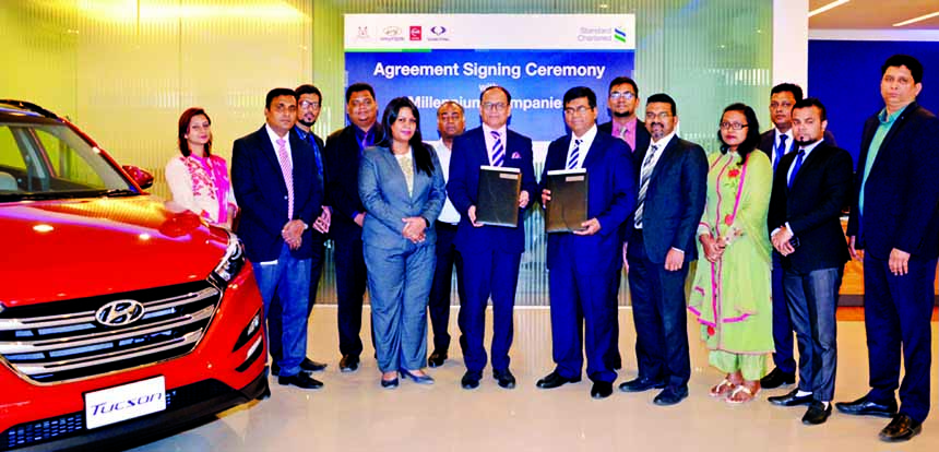 Syed Shakeel Ahmed, Managing Director, Hyundai Motors Bangladesh Ltd. and Makam E Mahmud Billah, Head Retail Products and Segments, Standard Chartered Bank (SCB) Bangladesh exchanging an MoU signing documents in the city recently. Under the deal, SCB has