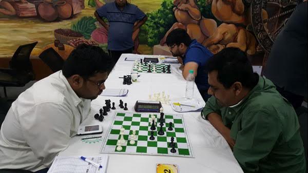 GM Ziaur Rahman (right) in action during the 5th round match of the 10th KIIT International Chess Festival at Bhubaneswar in Odisha, India on Monday.