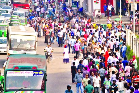 Due to shortage of transports, hundreds of people are seen waiting for hours at different bus stoppages on Monday, the second day of the holy month of Ramzan. A huge number of vehicles also got stuck due to gridlock at the busiest Farmgate area.