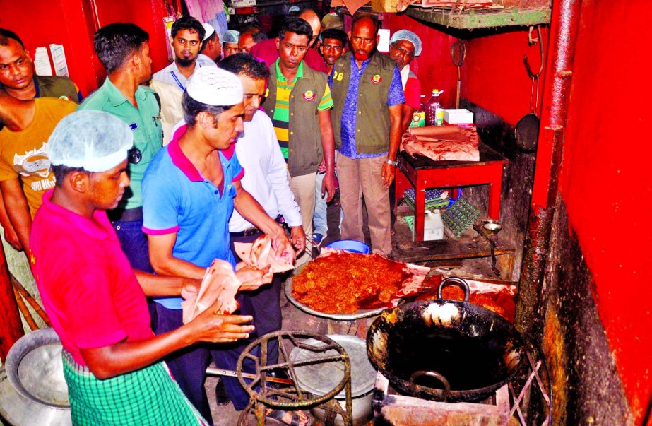 Anti-adulteration team of DMP on Monday raiding Fakhruddin Hotel at city's Ramna area fines Taka two lakhs on charge of preparing different Iftar items for sale with used oil in unhygienic condition on the 2nd day of Ramzan.