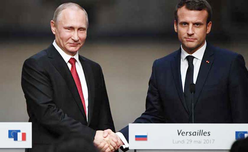 France's Emmanuel Macron with his Russian counterpart Vladimir Putin in Versailles.