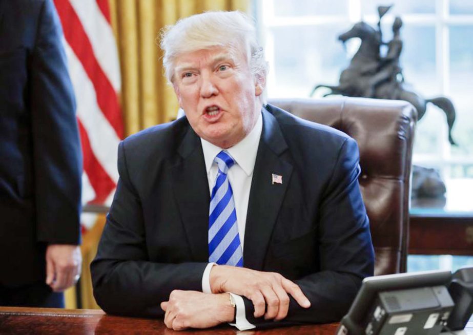 US President Donald Trump speaks in the Oval Office of the White House in Washington.
