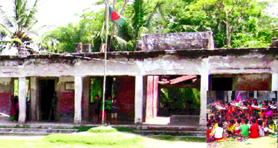 KHULNA: Students of Deuatala Govt Primary School in Morelganj are attending classes by risking life as the dilapidated school building may collapse anytime. This picture was taken yesterday.