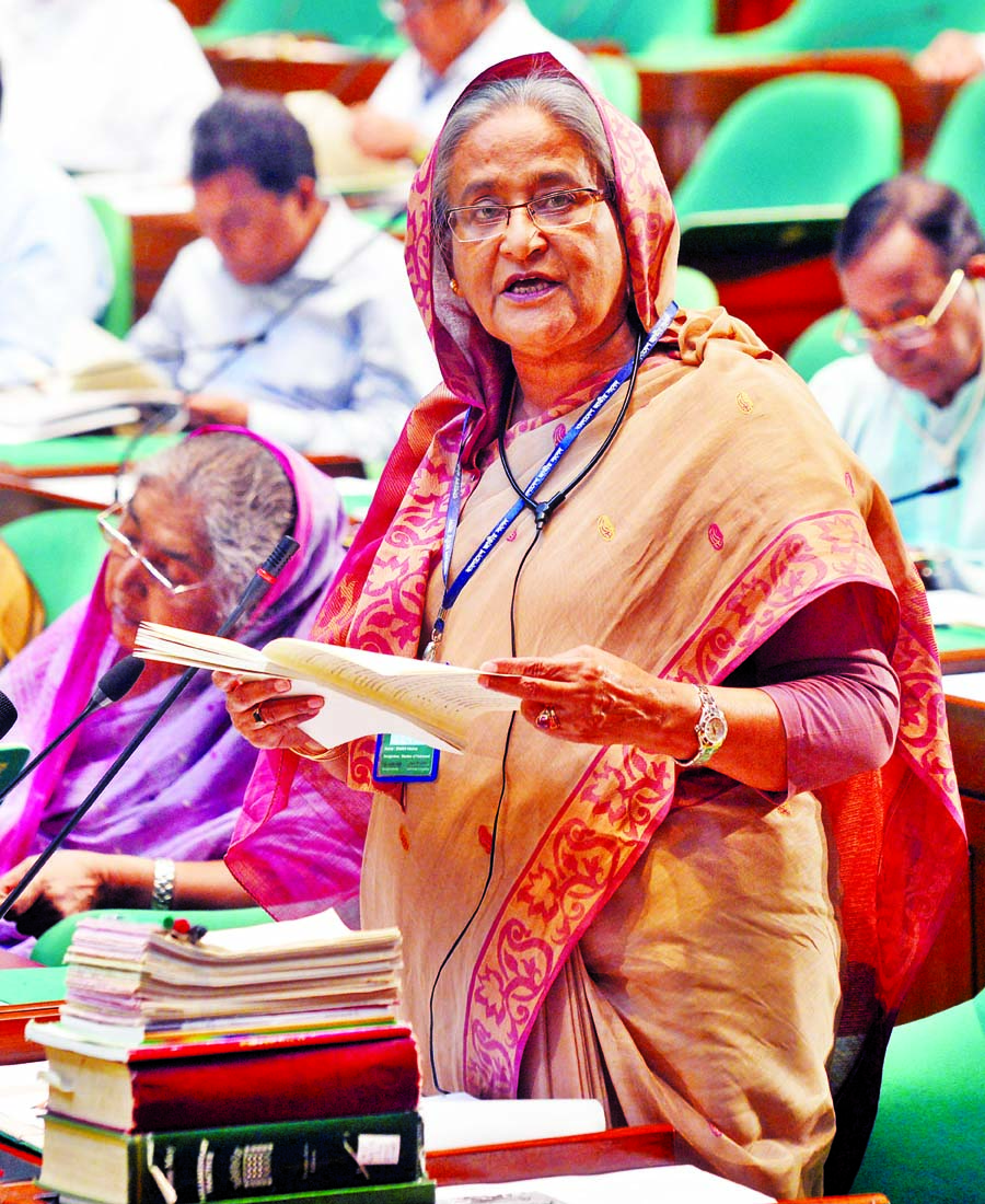Prime Minister and Leader of the House Sheikh Hasina replying to a supplementary during her question- answer session in the National Parliament yesterday. Photo : BSS