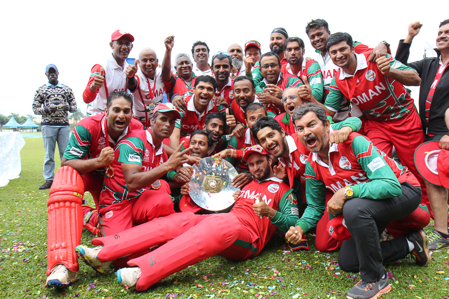 Oman celebrate after being crowned tournament champions of ICC World Cricket League Division Three against Canada in final at Kampala on Tuesday.