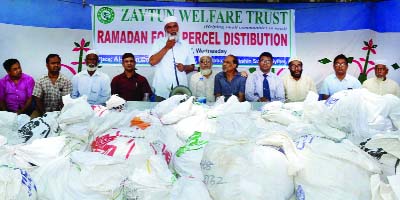 SYLHET: Abdul Majid Lal Mia, , Patron of Zaytun Welfare Trust speaking at an Iftar item distribution programme at Moghlapara Field on Wednesday.