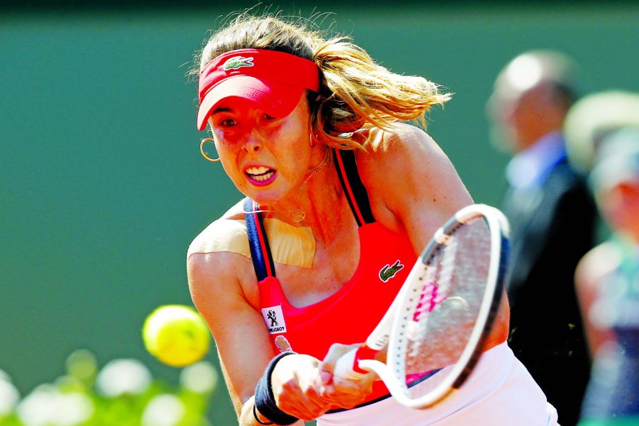 France's Alize Cornet returns the ball to Barbora Strycova of Czech Republic during their second round match of the French Open tennis tournament at the Roland Garros stadium in Paris on Thursday.