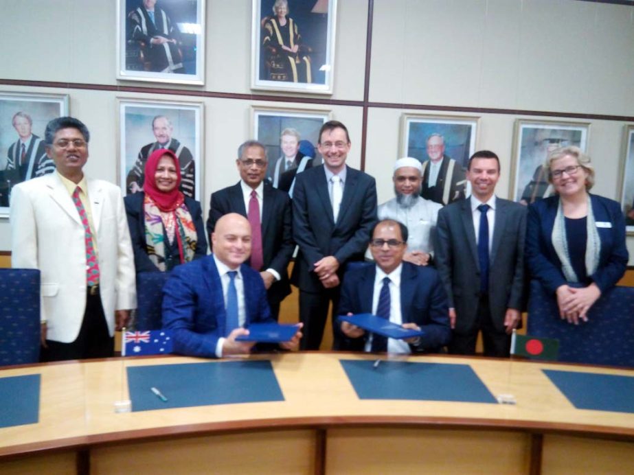 Prof Dr Mohammmad Yousuf Ali Mollah, Member, UGC witnessing a MoU signing ceremony held recently between the University Grants Commission of Bangladesh and the University of Wollongong, Australia for collaborative research, innovation and training at the