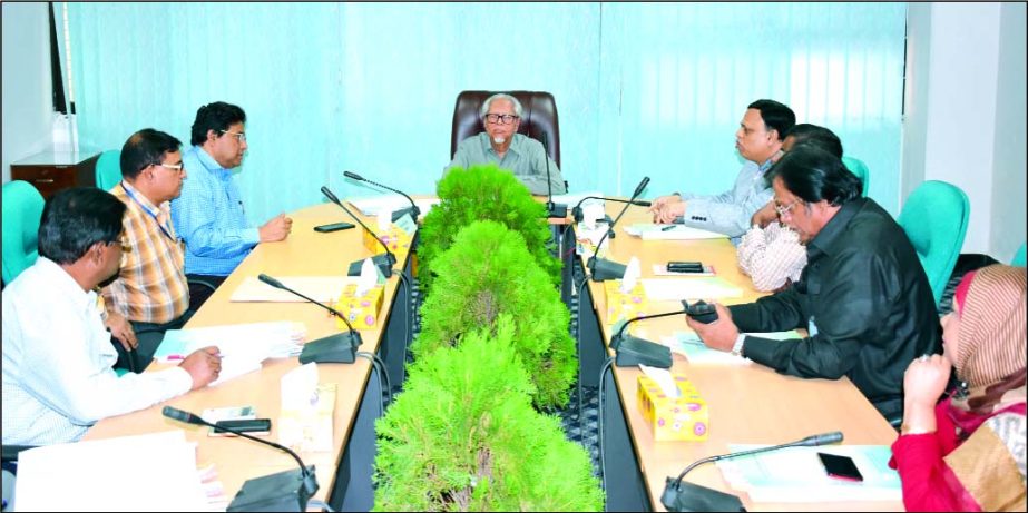 Sheikh Aminuddin Ahmed, Chairman, Board of Directors of Bangladesh House Building Finance Corporation, presiding over the 450th meeting at its head office in the city on Wednesday. Sudhangshu Shekhor Biswas, Md Akter-uz-Zaman, Md Jalal Uddin, Shams Al Muj