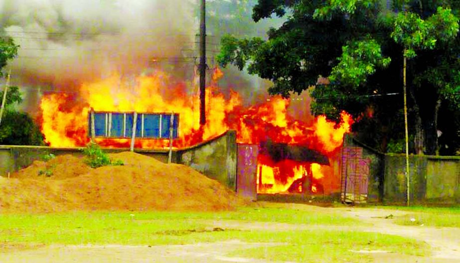 Angry protesters torched several houses at Langadu Upazila in Rangamati in protest against killing of Jubo League Organising Secretary Nurul Islam on Friday.