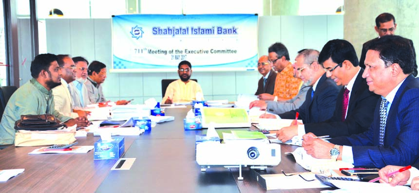 Md Sanaullah Shahid, EC Chairman of Shahjalal Islami Bank Limited presiding over the 711th meeting at the bank head office in the city recently. Farman R Chowdhury, Managing Director, Akkas Uddin Mollah, Anwer Hossain Khan, Khandaker Sakib Ahmed, Director