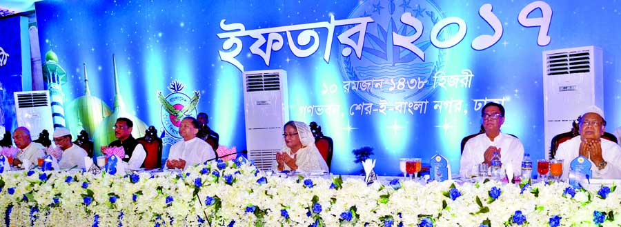 Prime Minister Sheikh Hasina along with others offering munajat at an Iftar Mahfil organised for the distinguished persons at Ganobhaban in the city on Tuesday.