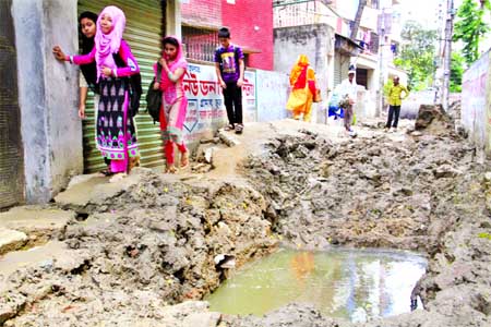 No respite from sufferings: Road digging at East Rampura in the city causes immense suffering to the commuters everyday as many of them get stuck in a recently-dug pit on the road. This photo was taken on Tuesday.