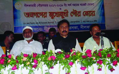 NILPHAMARI: Dewan Kamal Ahmed, Mayor, Nilphamari Municipality announcing budget of 2017-18 for Tk 67 cr in the development sector without imposing any tax at a public gathering titled' Janatar Mukhomukhi' arranged by Nilphamari Municipality with the