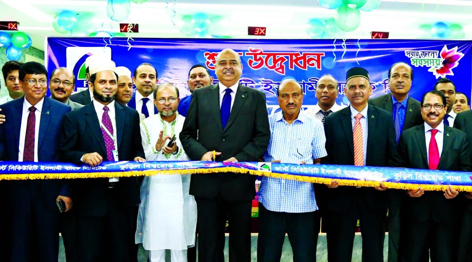 Syed Waseque Md Ali, Managing Director of First Security Islami Bank Ltd. inaugurating its Kuril Bishwaroad Branch in the city on Thursday. Quazi Osman Ali, Syed Habib Hasnat, AMDs, Md. Mustafa Khair, DMD and Syed Mostafa Shahnur, Manager of the branch of