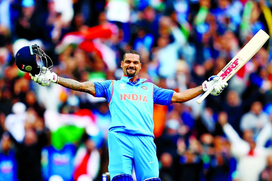 Shikhar Dhawan of India celebrates his century during the ICC Champions Trophy cricket match between India and Sri Lanka at the Oval in London on Thureday.