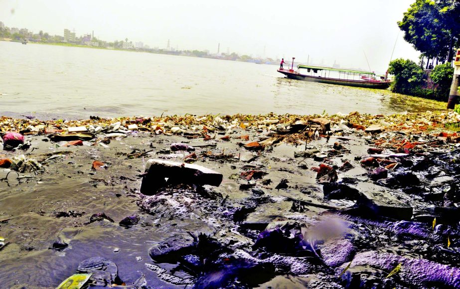 Chemical wastage of nearby dyeing factories flow the canal and ultimately finds way to river Buriganga and pollutes the entire river water body. This photo was taken from Shyampur area on Thursday.