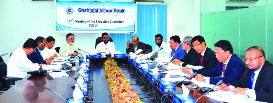 Md. Sanaullah Shahid, EC Chairman of Shahjalal Islami Bank Limited presiding over the 712th meeting at the bank head office in the city recently. Farman R Chowdhury, Managing Director, Akkas Uddin Mollah, Anwer Hossain Khan, Khandaker Sakib Ahmed, Directo