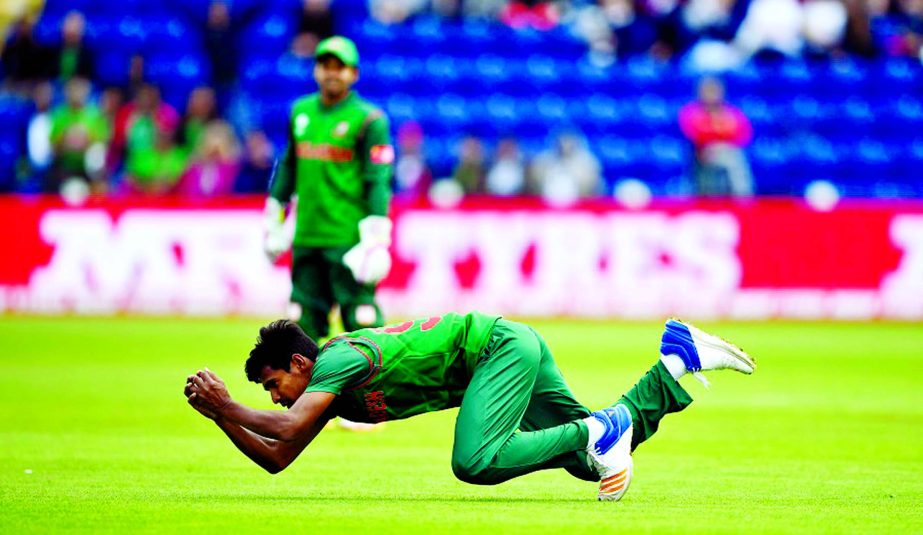 Bangladesh fielder Mustafizur Rahman swoops to catch Ross Taylor during the ICC Champions Trophy match between New Zealand and Bangladesh at SWALEC Stadium in Cardiff, Wales on Friday.