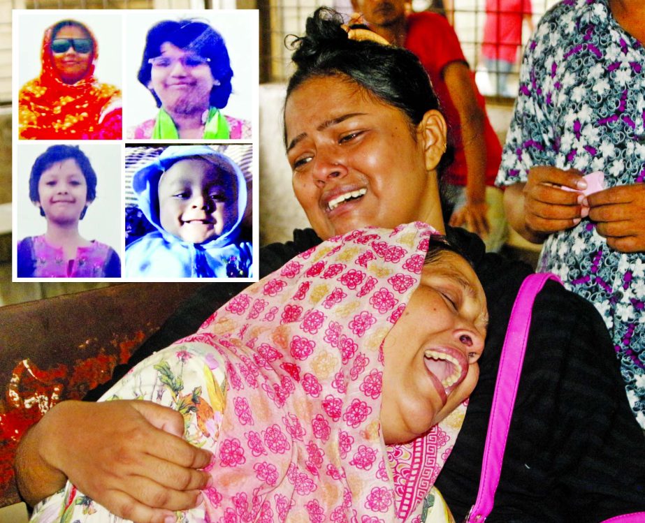Relatives wailing as a woman and her three children found dead at their house at Kamarpara in Dhaka on Friday. This photo was taken from Dhaka Medical College Hospital.