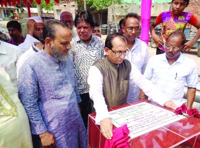 CHAPAINAWABGANJ: Md Abdul Wadud MP inaugurating the construction of roads and drains in Chapainawabganj municipality under 'Urban Governance and Infrastructure Improvement Project' (UGIIP)- 3 as Chief Guest on Friday.