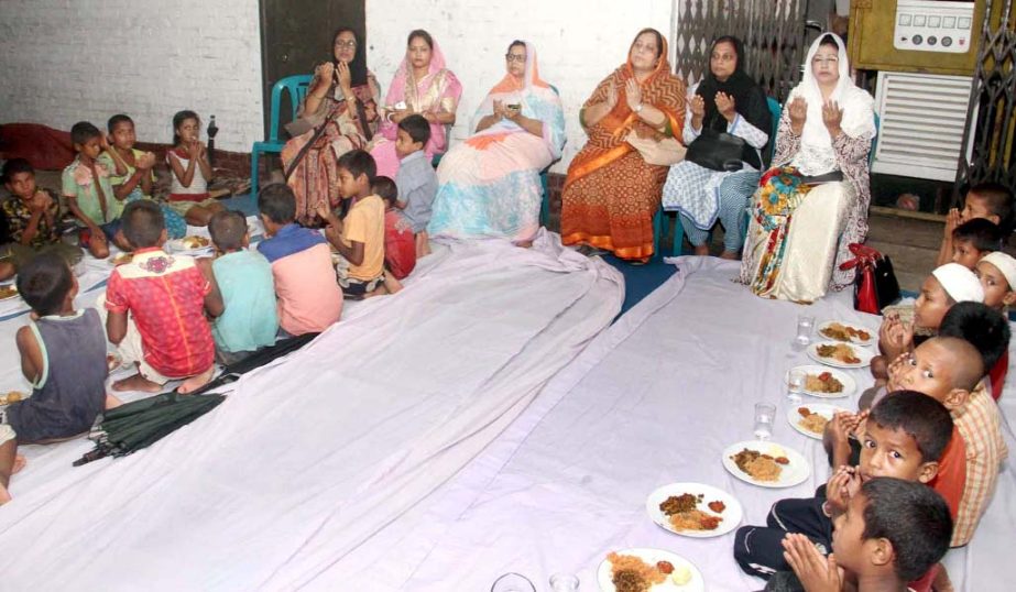 Hasina Mohiuddin, President, Chittagong Mahila Awami League offering Munajat at an iftar Mahfil with orphans in the Port City recently.