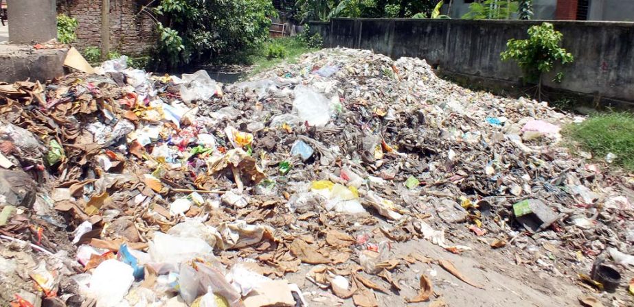 The big drain behind Chittagong Commerce College has been filled up with garbage at Madarbari area in Agrabad which make water logging. Authority concern should take proper step to clean the drain. This snap was taken yesterday.