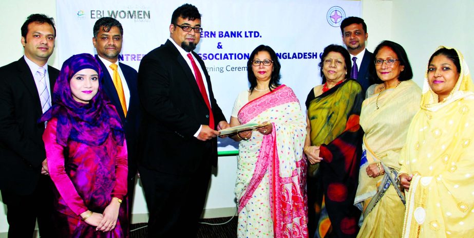 M Nazeem A Choudhury, Head of Consumer Banking of Eastern Bank Limited (EBL) and Nasreen Fatema Awal, President of Women Entrepreneurs Association of Bangladesh (WEAB) exchanging an agreement signing documents at the bank head office in the city recently.