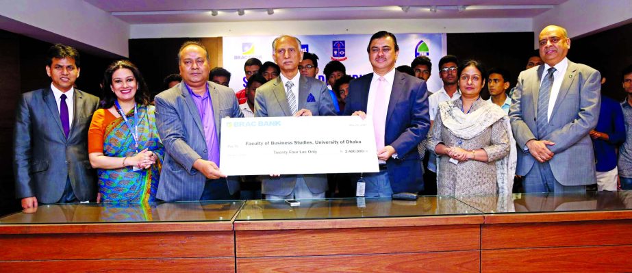 Selim RF Hussain, Managing Director of BRAC Bank Ltd. handing over a cheque to Dhaka University Vice Chancellor Prof. Dr. AAMS Arefin Siddique at his office recently. The bank provided the scholarships to the meritorious students of Business Studies Facul