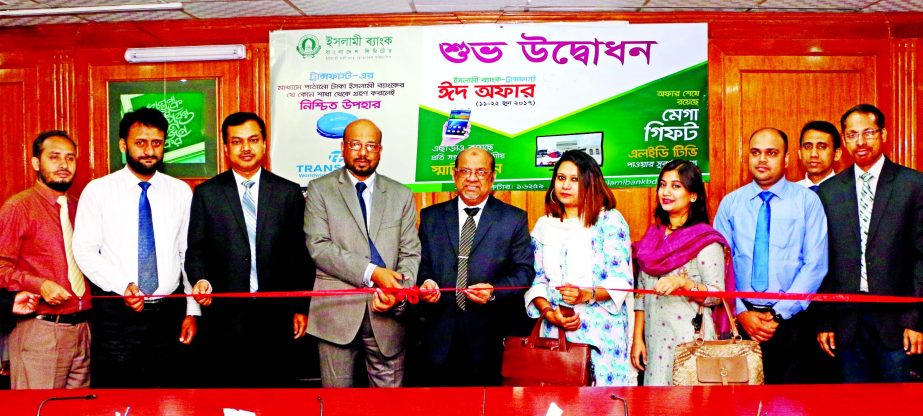 Abu Reza Md. Yeahia, DMD and Head of Development Wing of Islami Bank Bangladesh Ltd. and Rakasanda Hossain, Marketing and Branding Associate of Transfast Remittance LLC USA, inaugurating the Special Promotional Programme on the occasion of Eid-ul-Fitr at