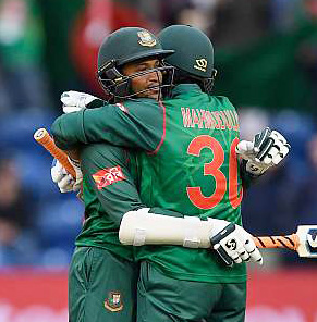 Mahmudullah and Shakib Al Hasan embrace during their record stand on Friday.
