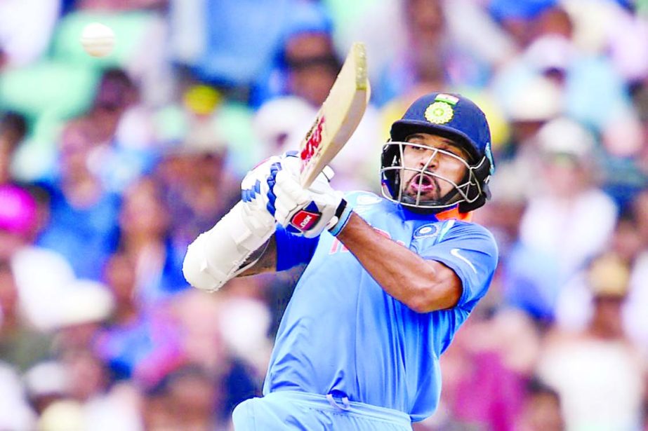 Shikhar Dhawan is hurried on a pull shot during the Champions Trophy 2017, Group B match between India and South Africa at the the Oval on Sunday.