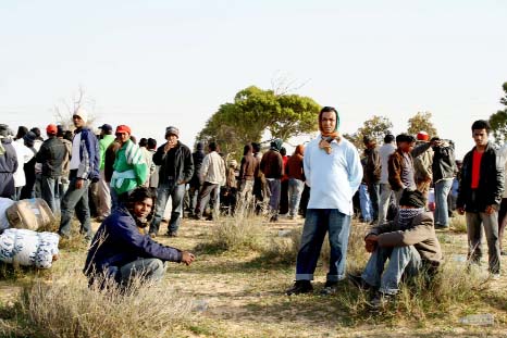 Migrants in a camp on the Libyan border to Tunisia in 2011.