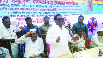 SAPAHAR(Naogaon): Babu Sadhan Chandra Majumder MP speaking at the workers' meeting of Awami League, Iftar and Doa Mahfil at Khanjanpur Girls' High School as Chief Guest yesterday.