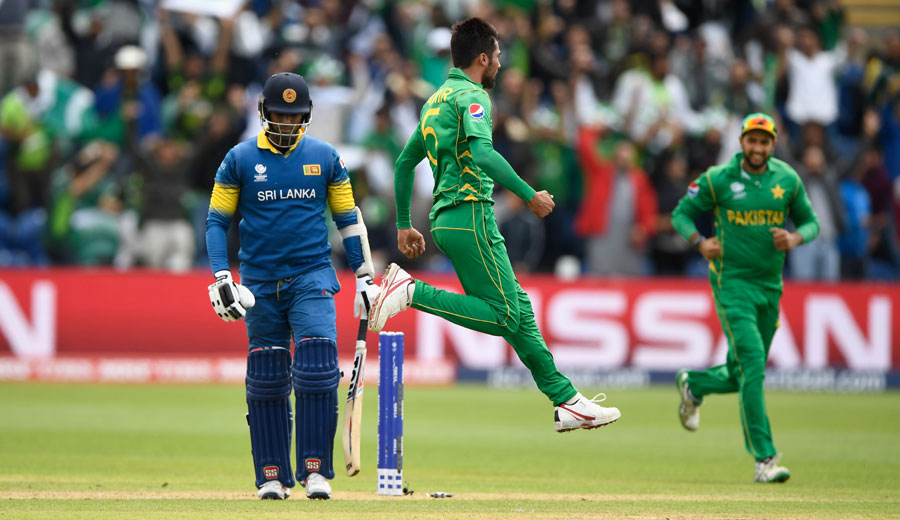 Mohammad Amir leaps in joy after taking his first wicket of the tournament of Champions Trophy 2017, Group B match between Sri Lanka and Pakistan at Cardiff, London on Monday.