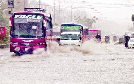 Incessant rains flooded most of the city roads and submerged low-lying areas on Monday. This photo was taken from Mirpur's Kalshi Road adjacent to the Journalists' Housing Society.