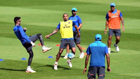 India cricketers take part in a training session at Edgbaston cricket ground in Birmingham on Wednesday ahead of the ICC Champions Trophy semi-final cricket match between India and Bangladesh.